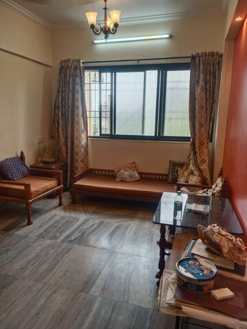 Living Room in 2 BHK Apartment at Divya Stuti CHS, Goregaon East – for Sale