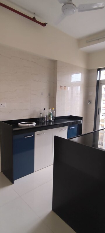 Kitchen in 1 BHK Apartment at Romell Rhythm, Malad West – for Sale