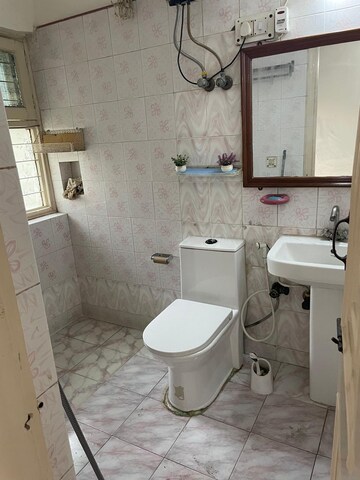 Bathroom in 3 BHK Apartment at Krishna Garden, Govindpuram – for Sale