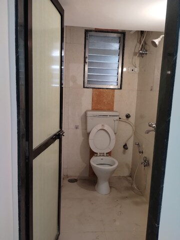 Bathroom in 1 BHK Apartment at Welfare CHS, Andheri West – for Rent
