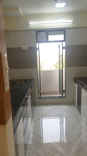 Kitchen in 1 BHK Apartment at Dombivli West – for Sale