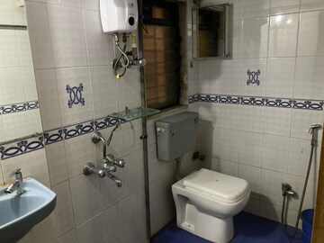 Bathroom in 1 BHK Apartment at Sundervan Complex, Andheri West – for Sale