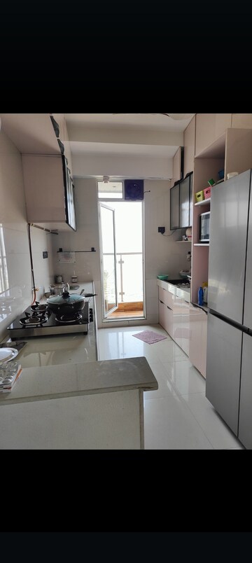 Kitchen in 2.5 BHK Apartment at Neelkanth Greens, Manpada – for Sale