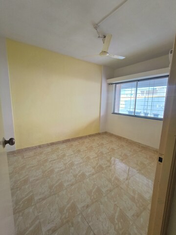 Room in 1 BHK Apartment at Punyadham Society, Wadgaon Sheri – for Sale