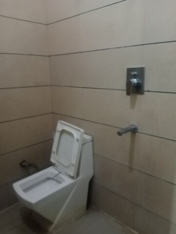 Bathroom in 1.5 BHK Builder Floor at Huda – for Rent