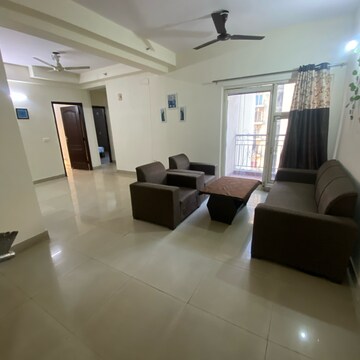 Living Room in 3 BHK Apartment at Gardenia Golf City, Noida Central – for Rent