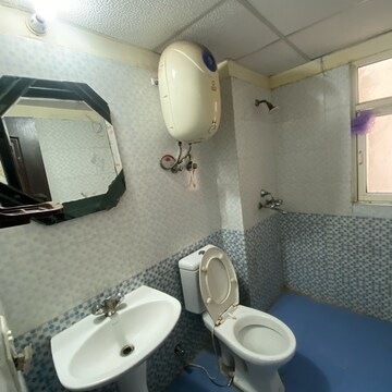 Bathroom in 3 BHK Apartment at Gardenia Golf City, Noida Central – for Rent