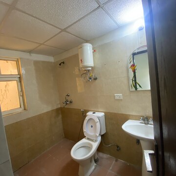 Bathroom in 3 BHK Apartment at Gardenia Golf City, Noida Central – for Rent