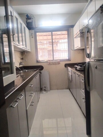 Kitchen in 2 BHK Apartment at Ravechi Heights, Kharghar – for Sale