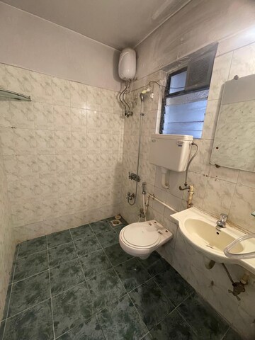 Bathroom in 3 BHK Apartment at Windsor Tower, Andheri West – for Sale