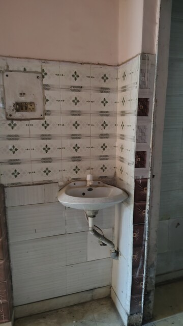 Bathroom in 1 BHK Apartment at Raj Nagar Extension – for Sale