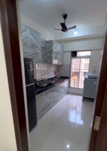 Kitchen in 2 BHK Apartment at Bini Winspace Amelio, Andheri West – for Rent