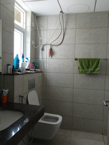 Bathroom in 3 BHK Apartment at Emaar Palm Heights, Sector 77 – for Rent