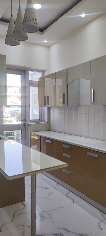 Kitchen in 3 BHK Apartment at Sudarshan Amrit Homes, Sector 88 – for Sale