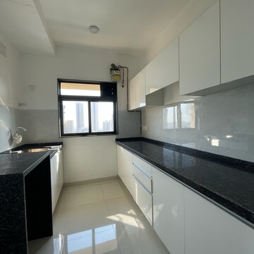 Kitchen in 2 BHK Apartment at Lalani Velentine Apartment VI, Riddhi Gardens – for Sale