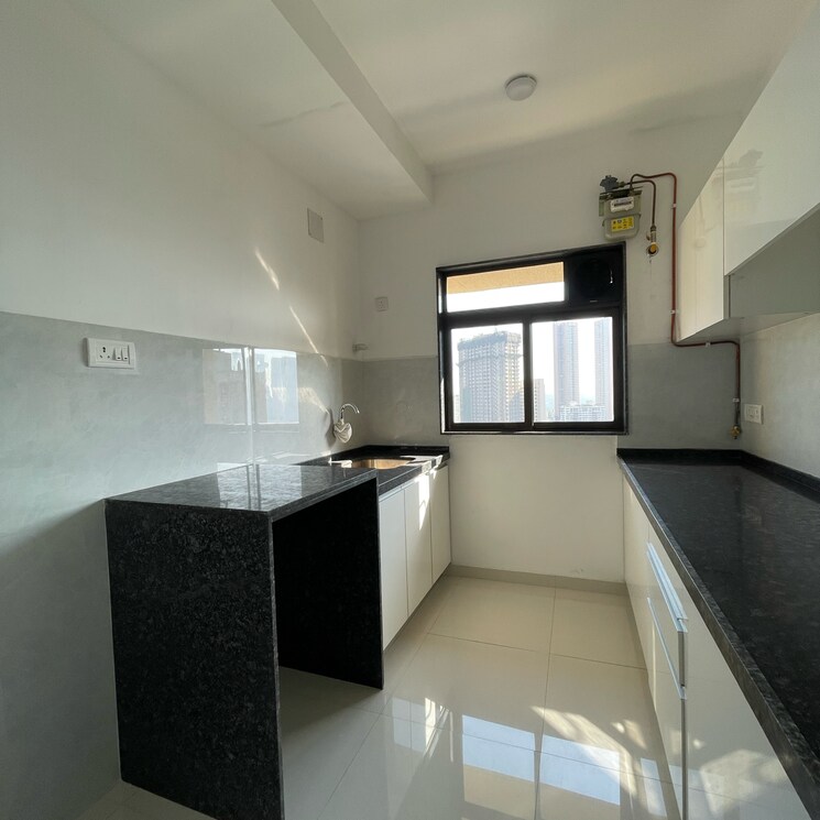 Kitchen, lalani-velentine-apartment-vi 2 Bedroom 690 Sq.Ft. Apartment In Riddhi Gardens Mumbai 8320631