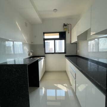 Kitchen in 2 BHK Apartment at Lalani Velentine Apartment VI, Riddhi Gardens – for Sale