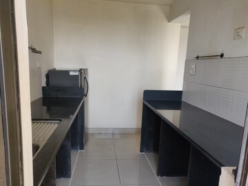 Kitchen in 2 BHK Apartment at Tata Amantra, Ashok Nagar – for Rent