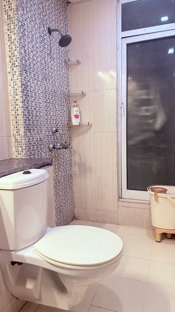 Bathroom in 3 BHK Apartment at Gaur Sportswood, Sector 79 – for Rent