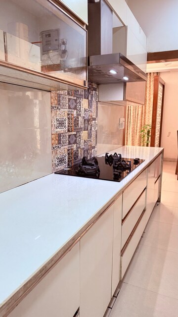 Kitchen in 3 BHK Apartment at Gaur Sportswood, Sector 79 – for Rent
