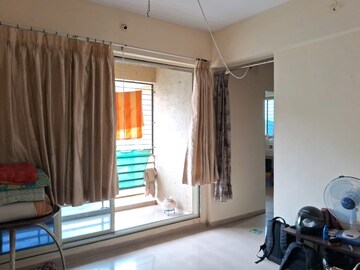 Living Room in 1 BHK Apartment at Padmadisha Paradise, Themghar – for Sale