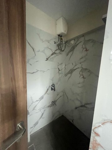 Bathroom in 2 BHK Apartment at Shiv Guru Ashish, Mulund East – for Rent
