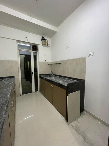 Kitchen in 2 BHK Apartment at Marathon Nexzone, New Panvel – for Rent