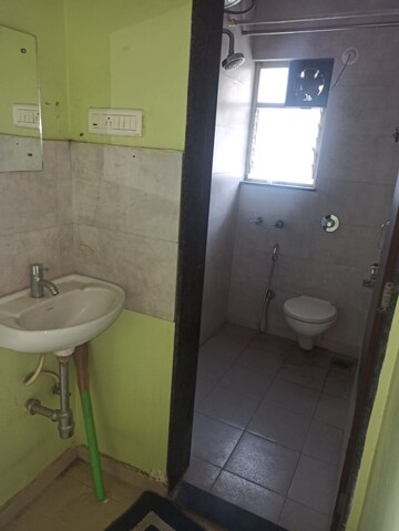Bathroom in 2 BHK Apartment at Vyas Anudatta CHS, Rambaug Colony – for Rent