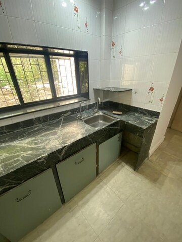 Kitchen in 1 BHK Apartment at Anand Nagar Park CHS, Kothrud – for Rent