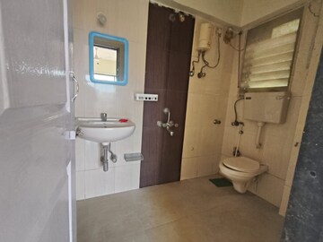 Bathroom in 2 BHK Apartment at Ajmera Yogi Nagar, Borivali West – for Rent