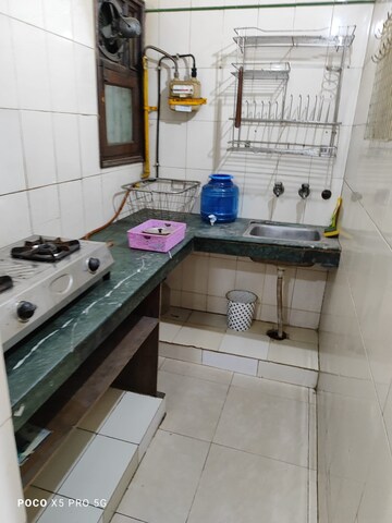 Kitchen in Studio Apartment at Arun Vihar Sector 37, Sector 37 – for Rent