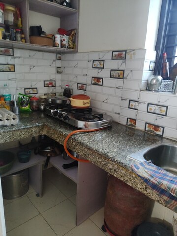 Kitchen in 1 RK Villa at RWA Apartments, Sector 31 – for Rent