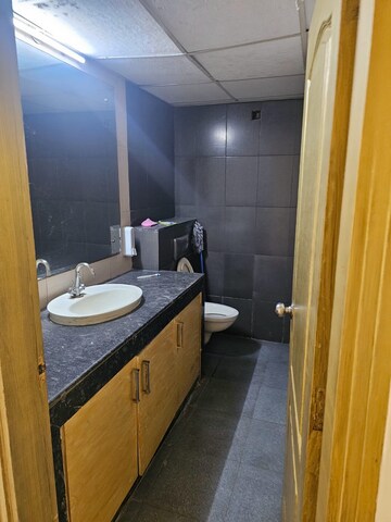 Kitchen in 4 BHK Apartment at Adani Oyster Grande Phase 2, Sector 102 – for Rent