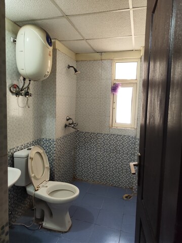Bathroom in 3 BHK Apartment at Aims Golf City, Sector 75 – for Rent