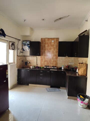 Kitchen in 3 BHK Apartment at Aims Golf City, Sector 75 – for Rent