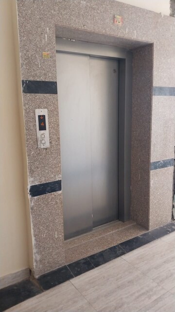 Building Lobby in 1 BHK Apartment at Eureka Diya Green City, Raj Nagar Extension – for Sale