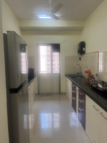 Kitchen in 2 BHK Apartment at Indiabulls Greens, New Panvel – for Rent