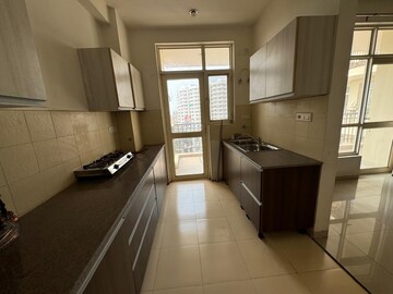 Kitchen in 3 BHK Apartment at Sushma Elite Cross, Dhakoli Village – for Sale