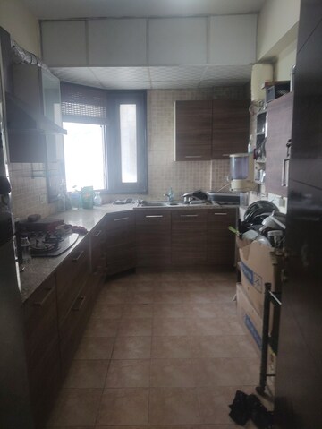 Kitchen in 2 BHK Apartment at Eros Kenwood Tower, Charmwood Village – for Sale