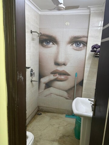 Bathroom in 3 BHK Apartment at Mahavir Enclave 1 – for Sale