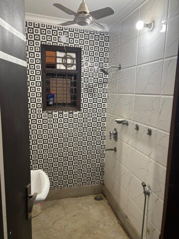 Bathroom in 3 BHK Apartment at Mahavir Enclave 1 – for Sale