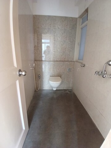 Bathroom in 2 BHK Apartment at Vijay Galaxy, Waghbil – for Sale