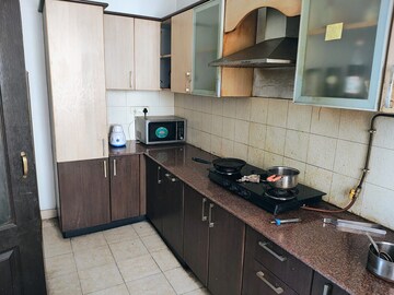 Kitchen in 3 BHK Apartment at Gaur Atulyam, Omicron I Greater Noida – for Rent