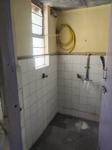 Bathroom in 1 BHK Apartment at Naiknavare Gardenia, Wadgaon Sheri – for Rent