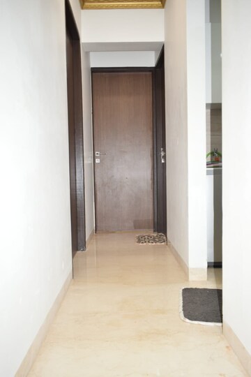 Building Lobby in 2 BHK Apartment at Omkar Meridia, Kurla West – for Rent
