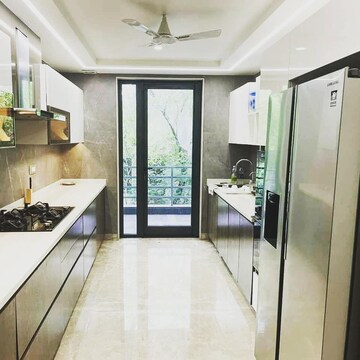 Kitchen in 3.5 BHK Apartment at Ambience Creacions, Sector 22 – for Rent