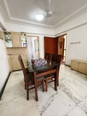 Living Room in 3 BHK Apartment at Grenville CHS, Andheri West – for Rent