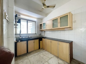 Kitchen in 3 BHK Apartment at Grenville CHS, Andheri West – for Rent