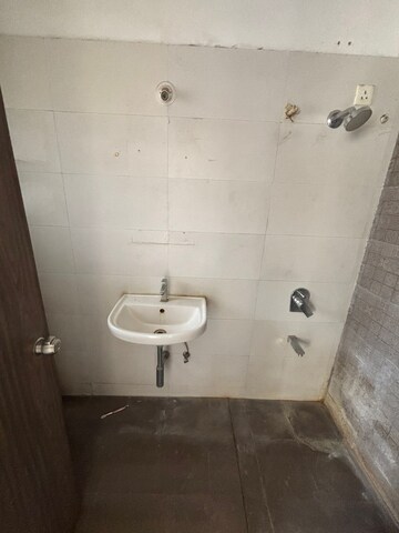 Bathroom in 3 BHK Apartment at Karan Suncoast, Bavdhan – for Rent