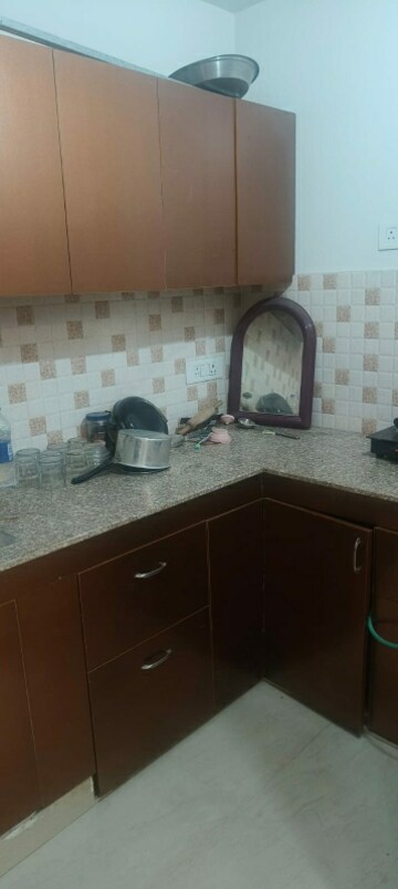 Kitchen in 2 BHK Apartment at Charms Castle, Raj Nagar Extension – for Rent